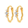 Boucles d'oreilles créoles ondulées en plaqué or avec trois zircons
