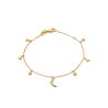 Bracelet en plaqué or avec breloques lune et étoiles
