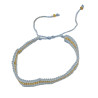 Bracelet Tissé Bleu Ciel avec Détails Dorés