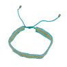 Bracelet Tissé Turquoise avec Perles Dorées Étincelantes
