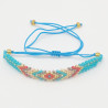 Bracelet Tissé Turquoise avec Motif Ethnique Vibrant