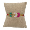 Bracelet Tissé Rose, Turquoise et Doré au Motif Chevron Élégant