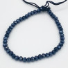Bracelet en Perles Noires Irisées avec Cordon Ajustable