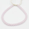 Bracelet en Perles Roses Facettées avec Cordon Blanc Ajustable