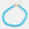 Bracelet en Perles Facettées Turquoise avec Cordon Blanc Ajustable