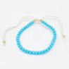 Bracelet en Perles Facettées Turquoise avec Cordon Blanc Ajustable