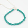 Bracelet en Perles Facettées Vert Canard avec Cordon Blanc Ajustable
