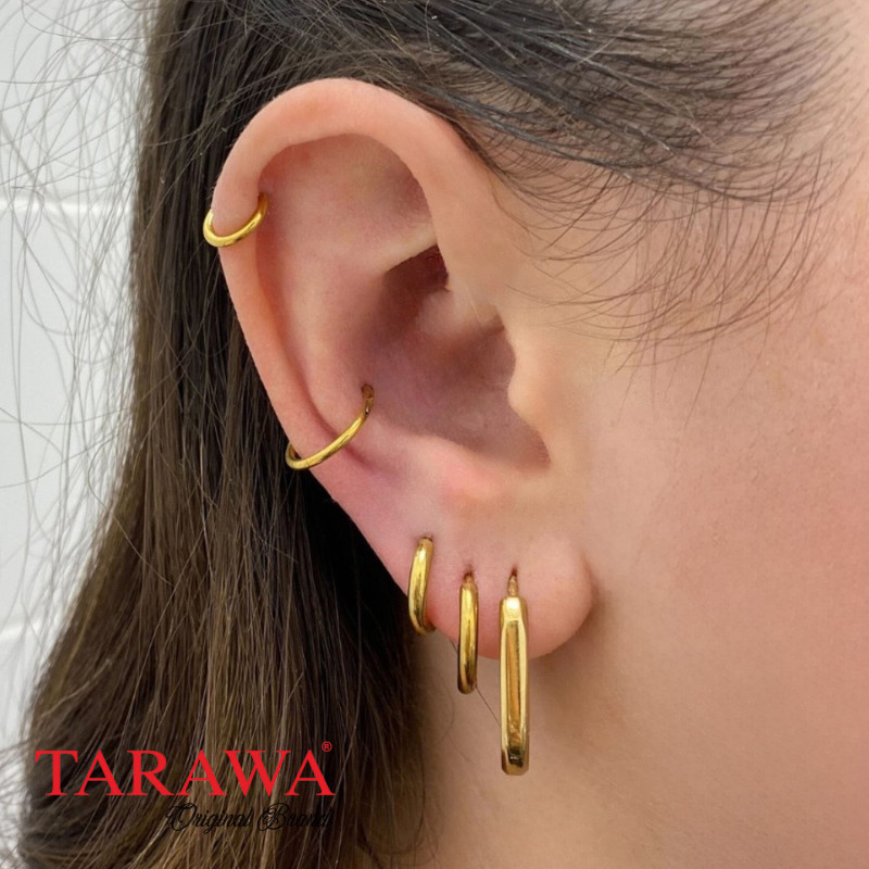 Composition doré anneaux d'oreilles