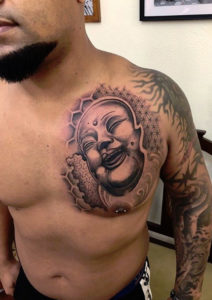 Tatouage funny bouddha par Diego Cavallini Tarawa Cap d'Agde