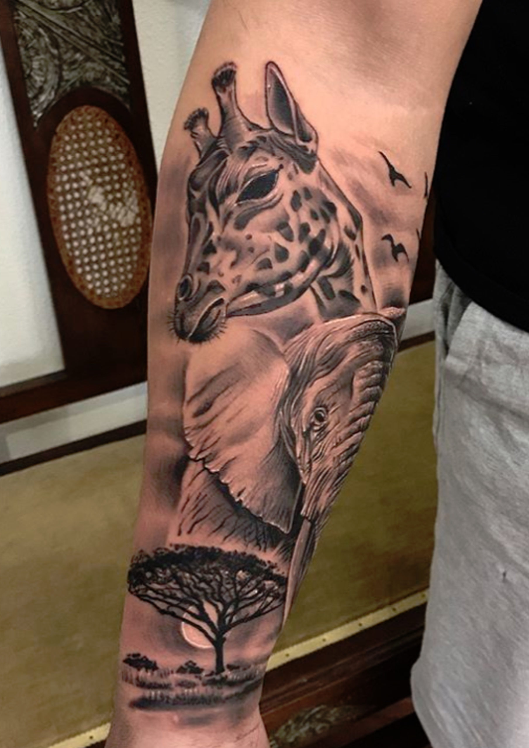 tatouage girafe Afrique par Diego Cavallini Tarawa Cap d'Agde